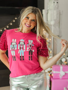 Nutcracker graphic on pink T-shirt secret sleeve